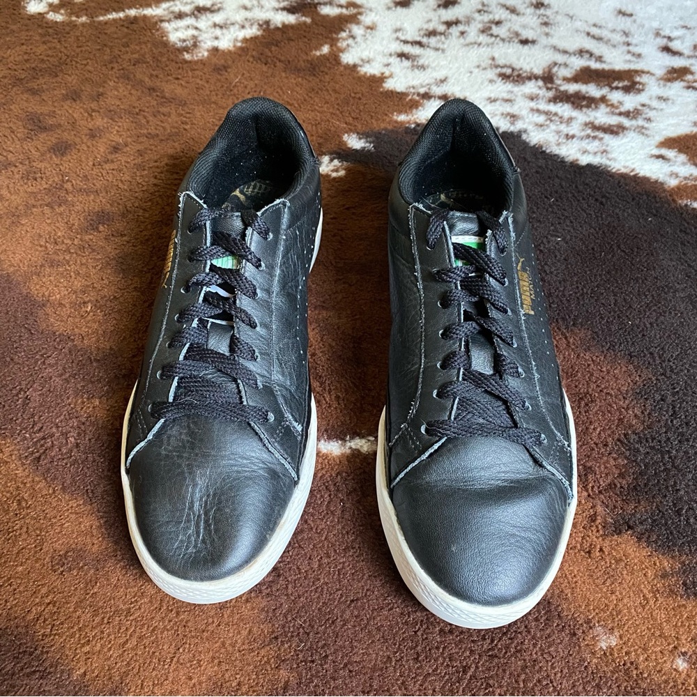 Classic Puma kicks, black sneaker, size 7